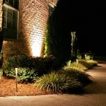 Lighted walkway in front of home
